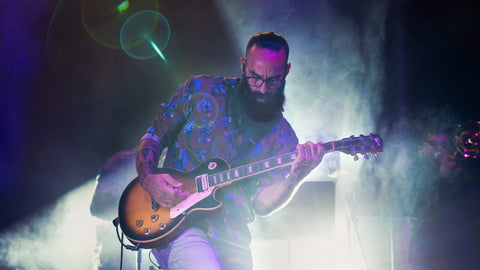 Group portrait of Cultura Profética band in Miami